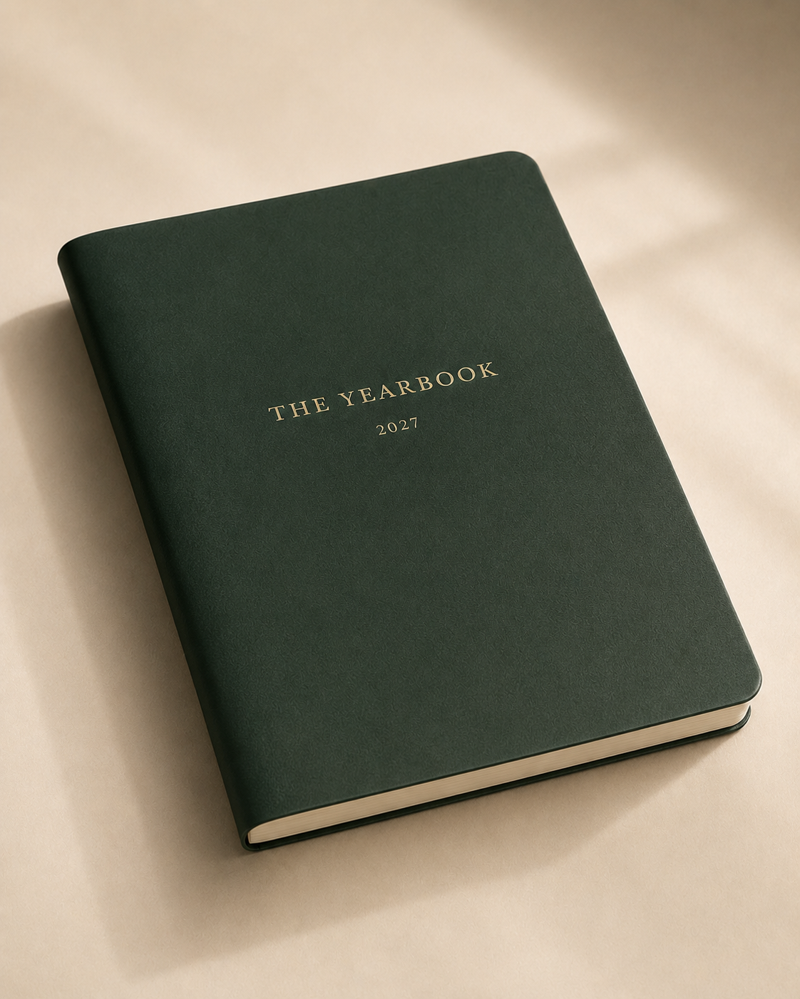 The Yearbook 2027 annual planner with a deep green cover and brass title stamping.